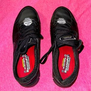 Black Skechers sneakers